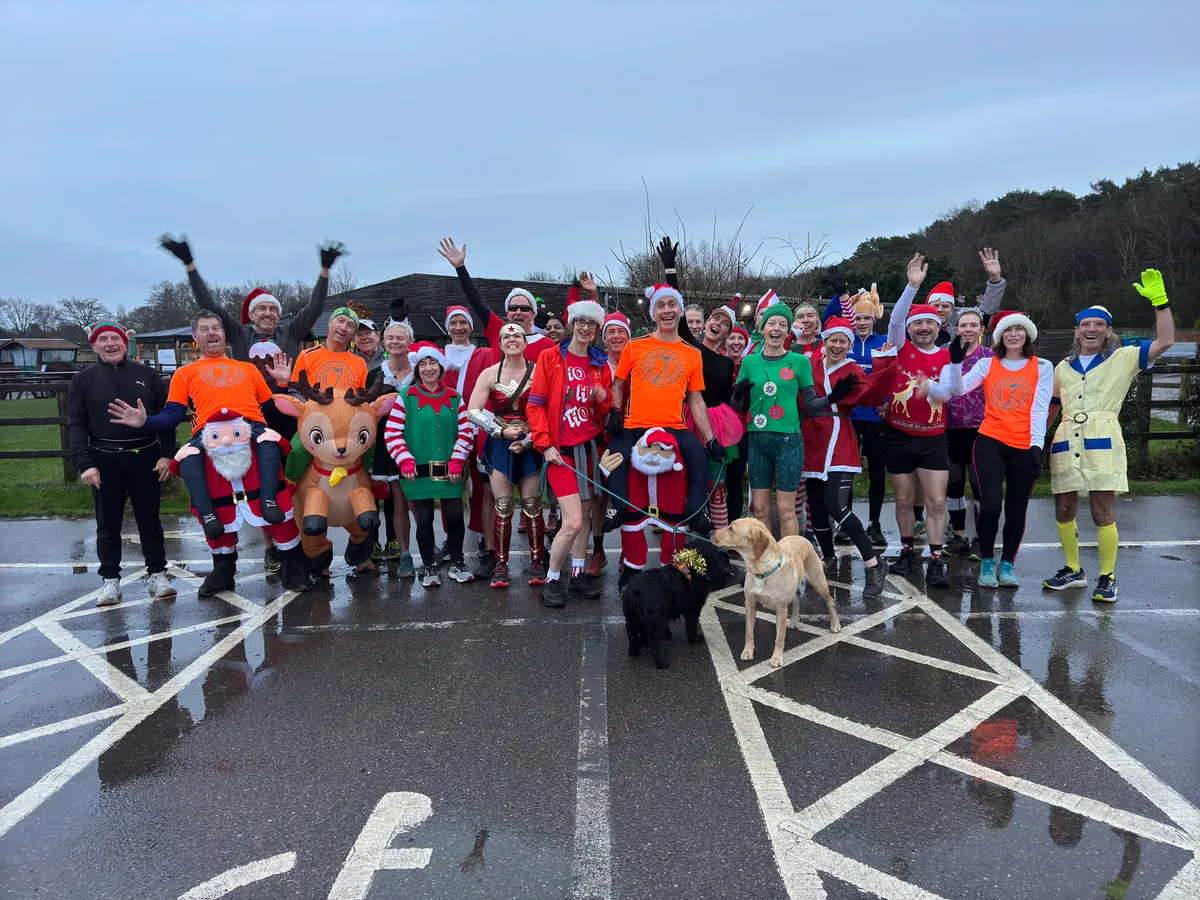 Horsell Runners at the Welcome to the Jungle sign